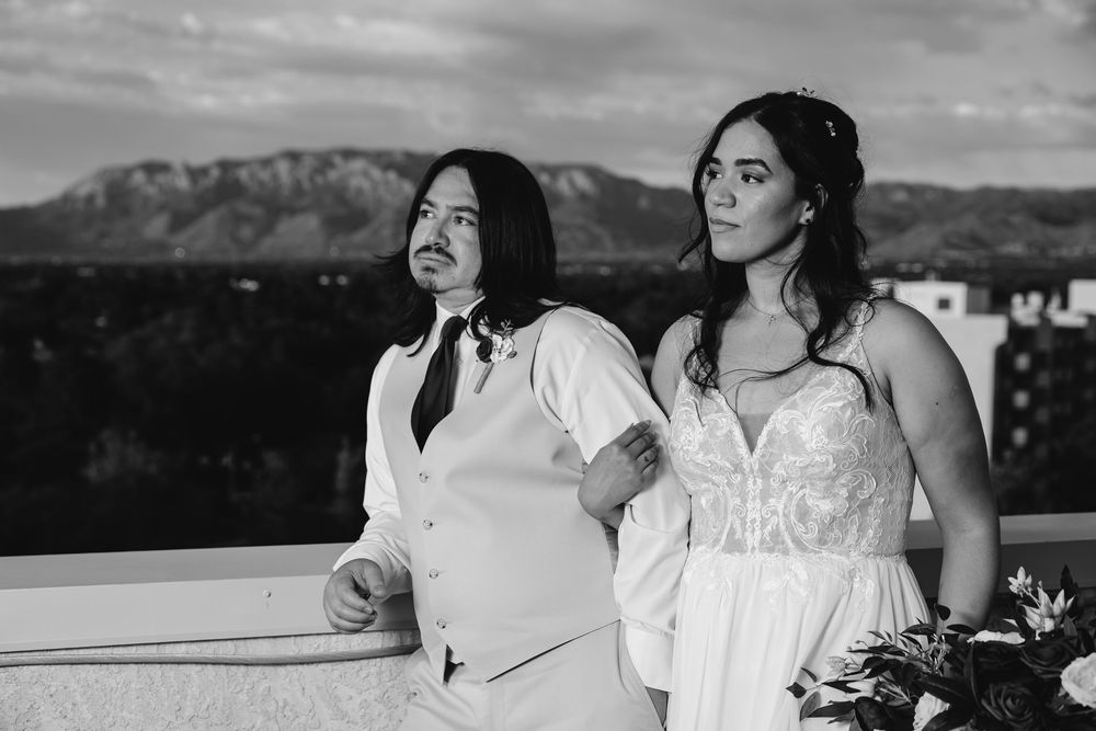 A wedding celebration in a scenic mountain location in black and white photography.