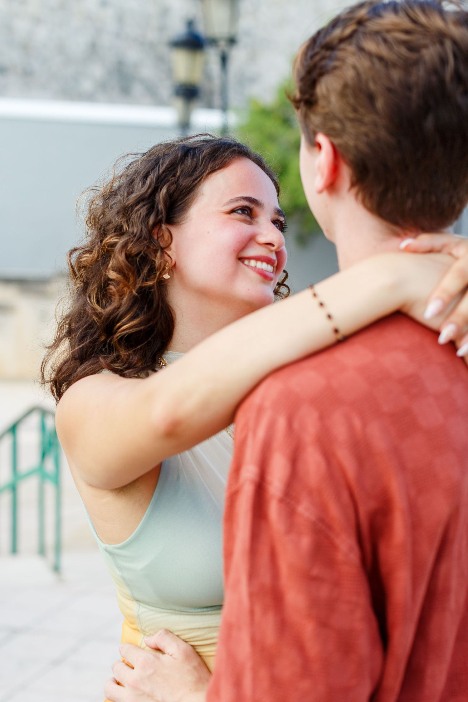 Surprise marriage proposal in Old San Juan, Puerto Rico. Paseo de la Princesa. Man and woman.