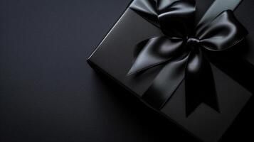 A row of elegant black gift boxes with satin ribbons arranged against a dark background.