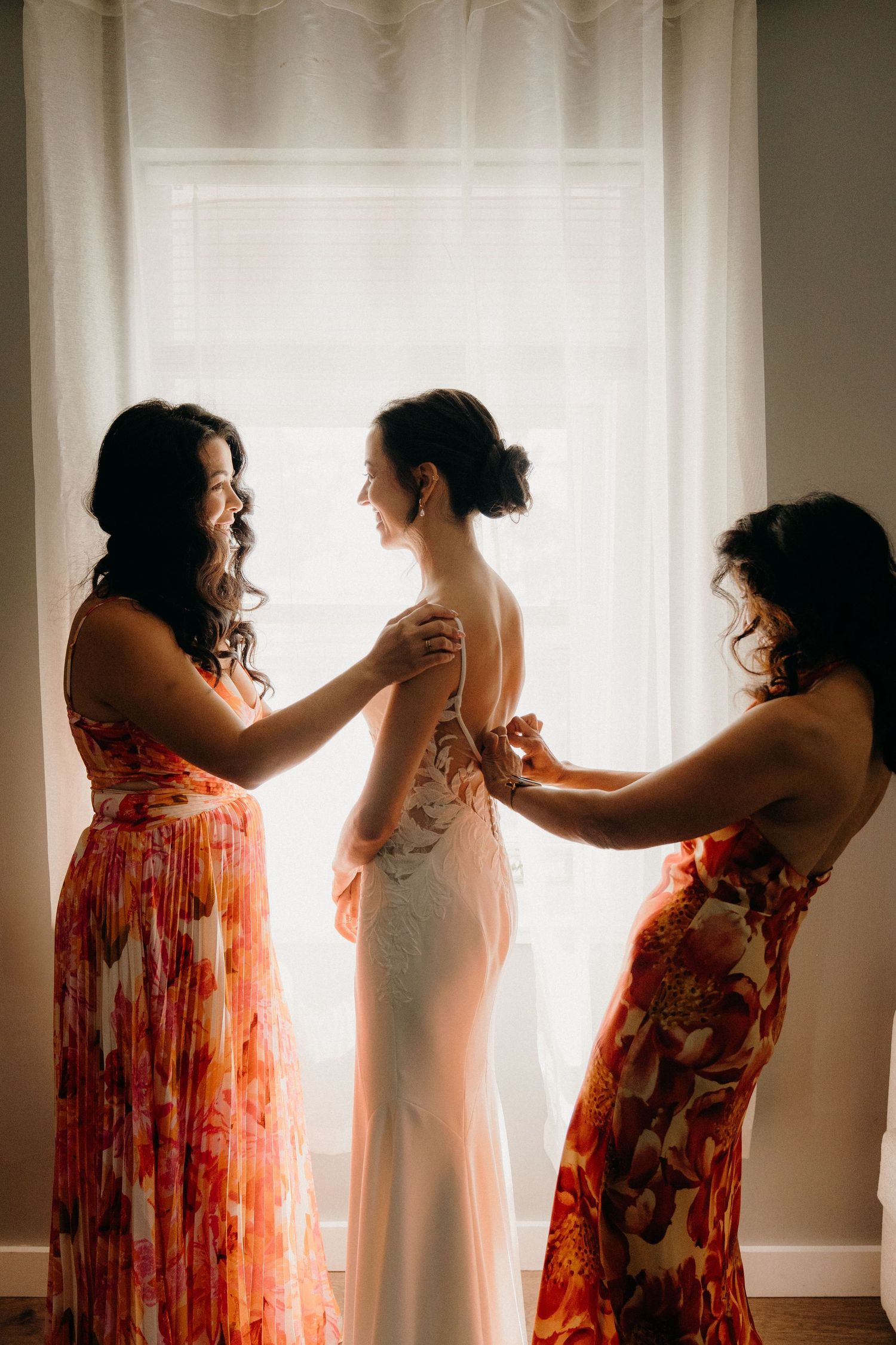A sequence of silhouettes showing preparation moments before a wedding. Taken at The Sanctuary Roosevelt Island