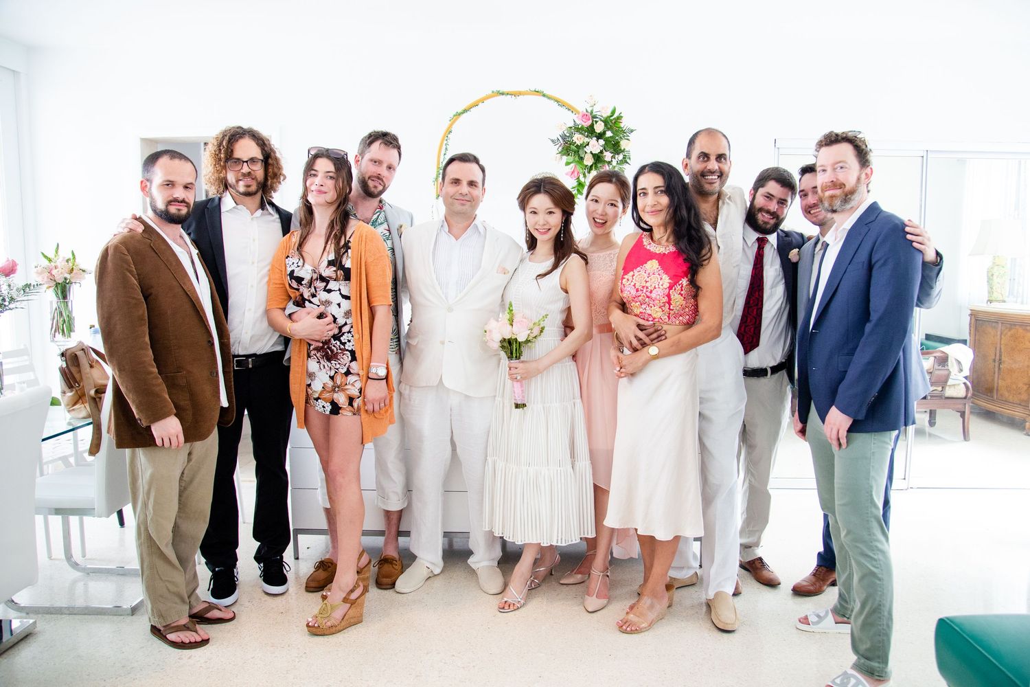Bride and groom with guests. Micro wedding in San Juan, Puerto Rico.