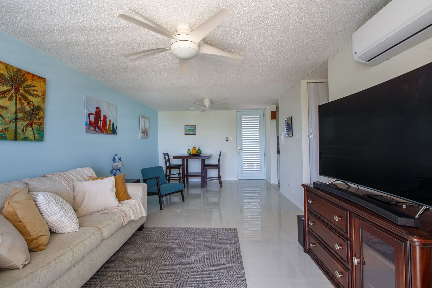 Real estate photography. Living room. Short-term rental in Playa Azul Tower 1 in Luquillo, Puerto Rico.