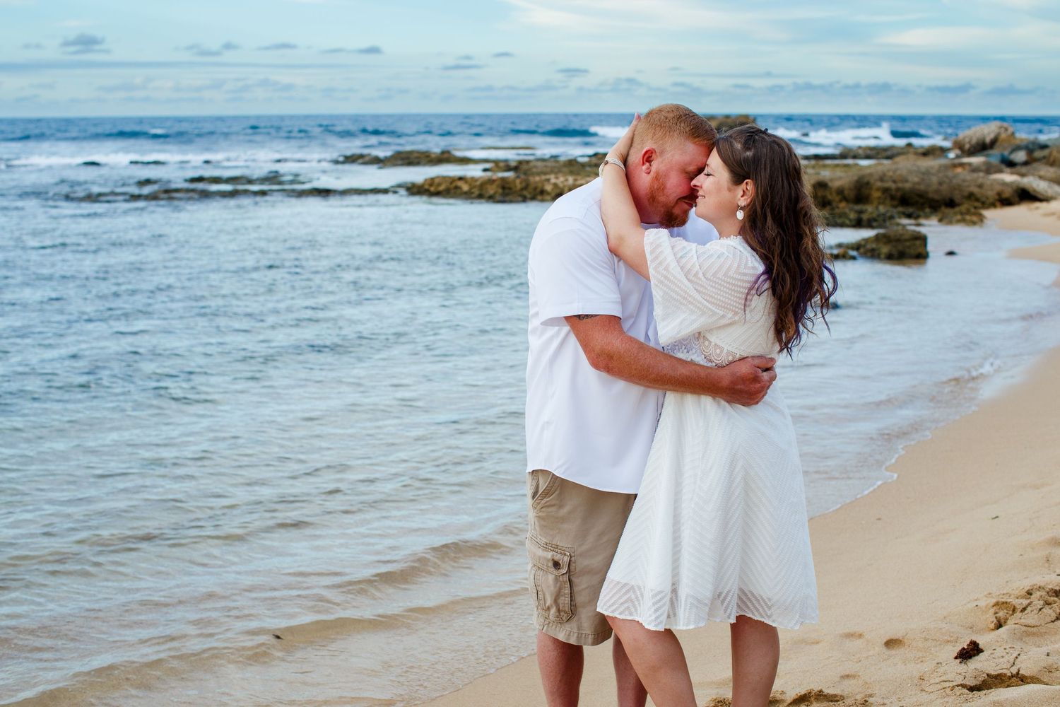 Elopement on the beach at Balneario del Escambrón in Old San Juan, Puerto Rico. Couples portrait - bride and groom.