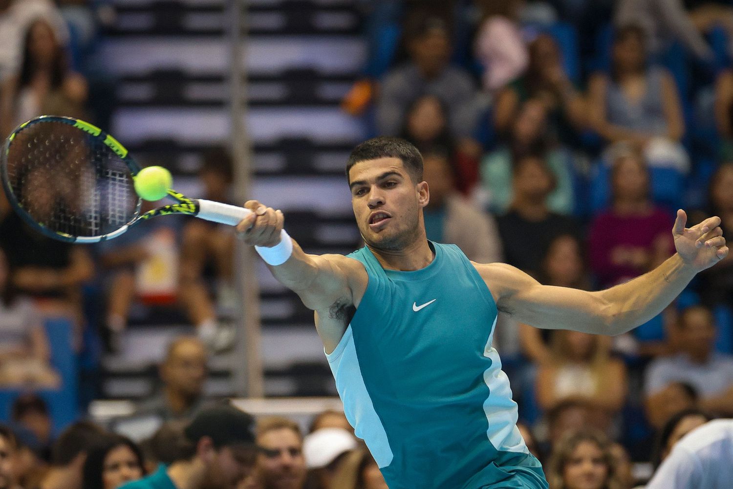 Carlos Alcaraz plays a shot during the exhibition match Battle of Legends: Frances Tiafoe vs. Carlos Alcaraz