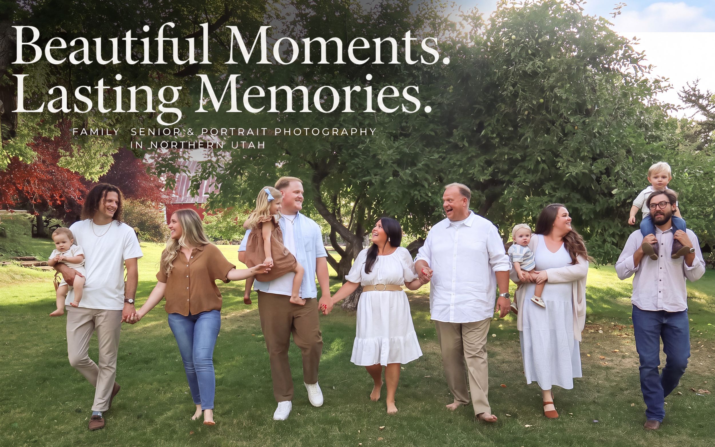 Large multigenerational family walking together on a sunny grassy lawn for a Utah family portrait photography session.