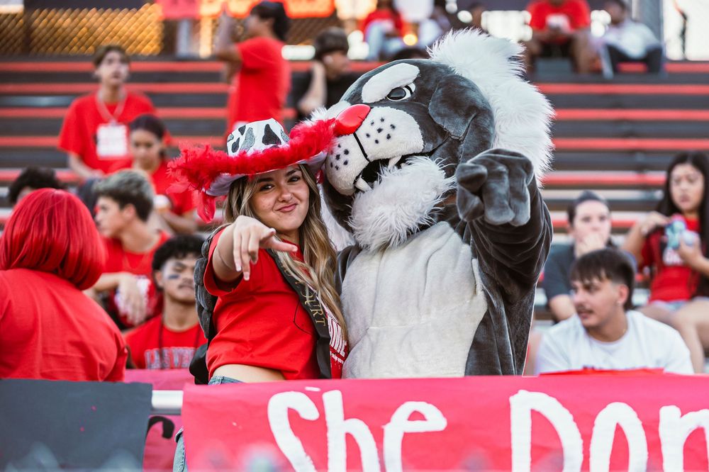 School Mascot and stuco kid posing