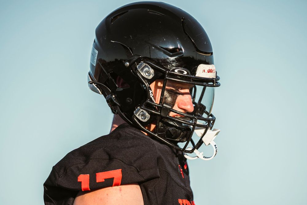 Football player looking off right frame