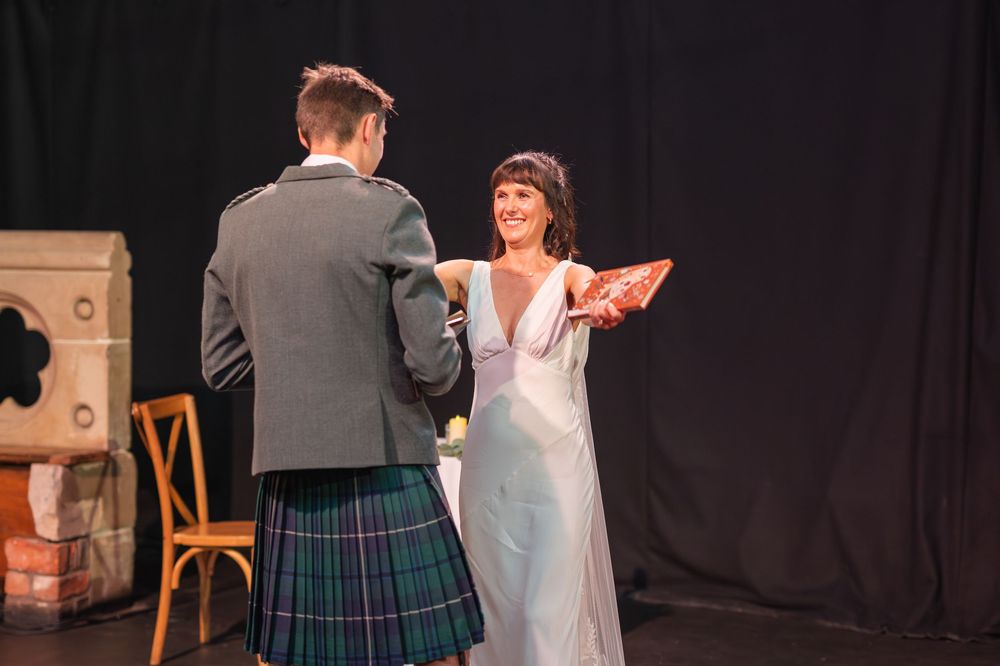 Traditional Scottish wedding ceremony moments in a dimly lit venue.
