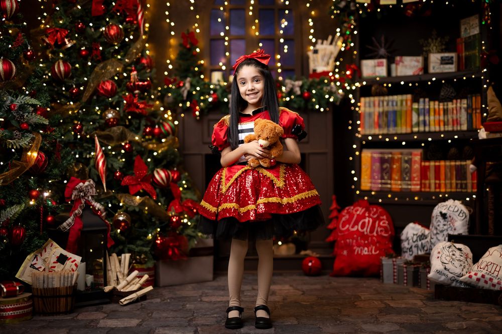 A group of Christmas themed photos with decorated trees, red dresses, and festive holiday lights creating a warm ambiance.