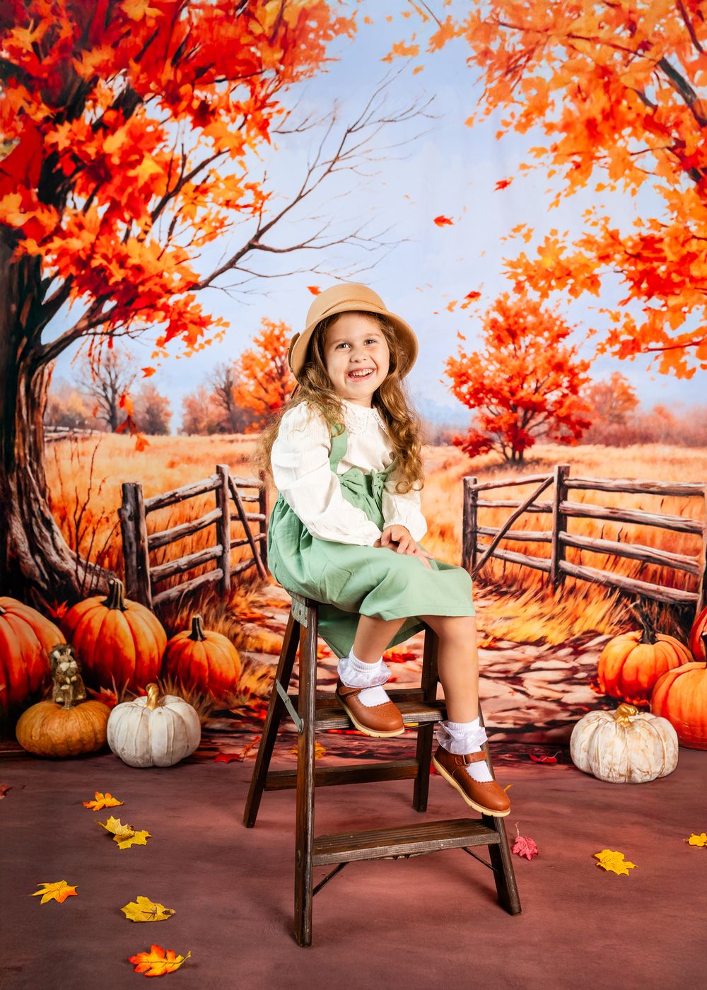 Autumn scene with rustic bench, large pumpkins, and vibrant orange maple leaves against a wooden fence backdrop.