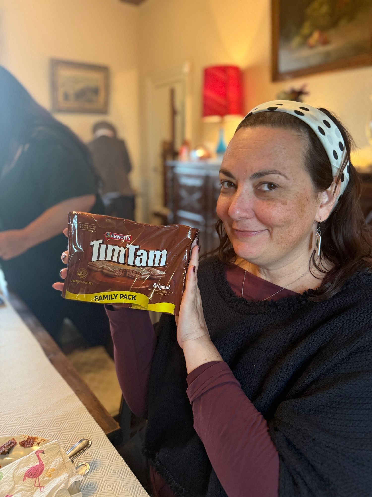 Tim Tam chocolate biscuits being displayed on a table during a snack break.
