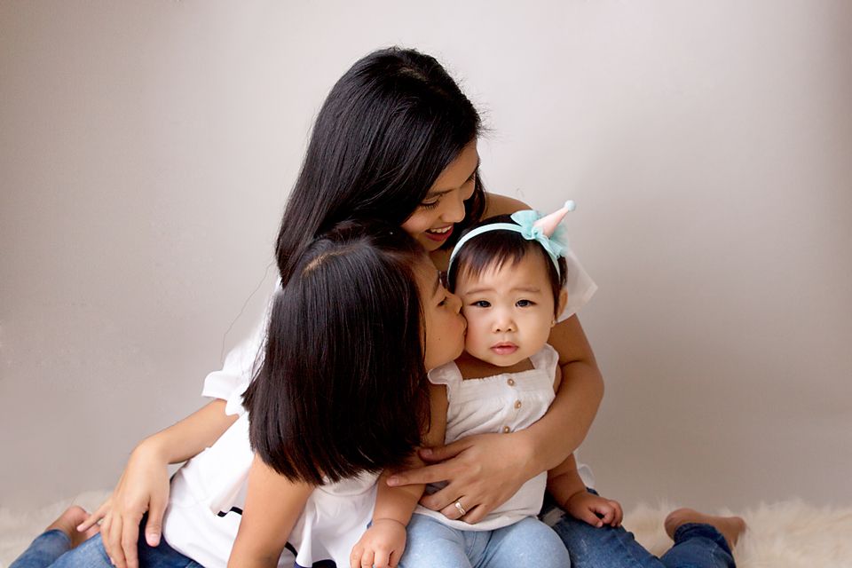 Natural family photo session capturing genuine interactions and smiles.