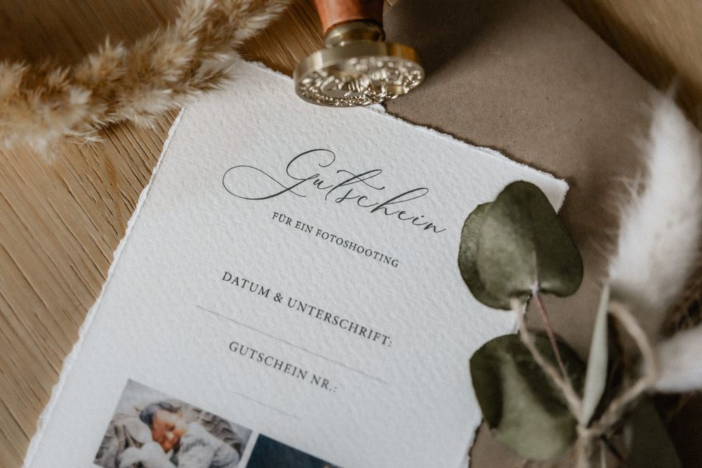Elegant wedding stationery with vintage-style decorative elements and soft photography.
