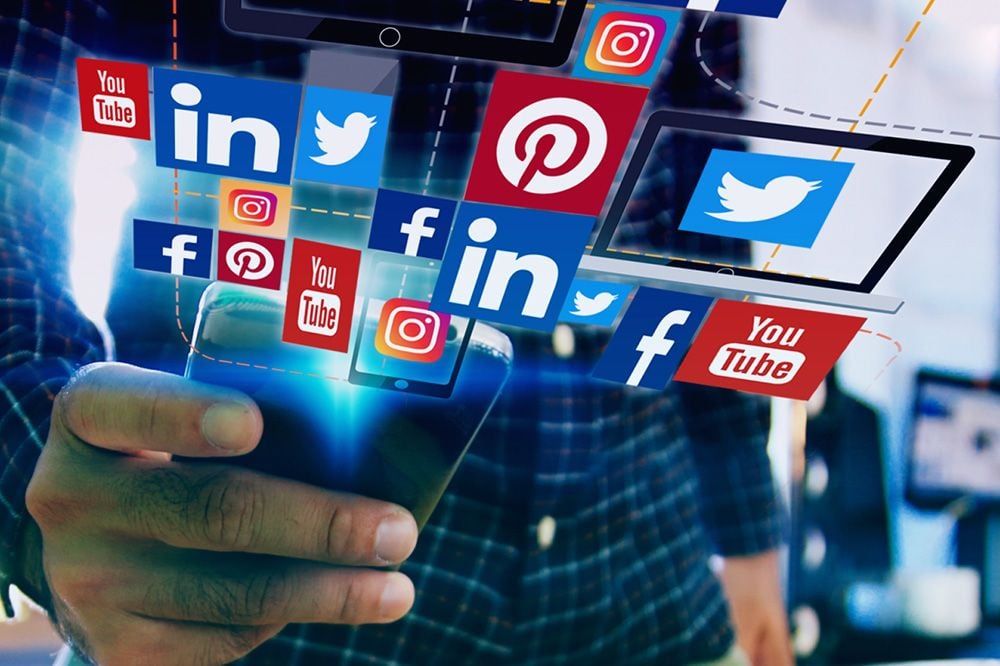 Social media icons and logos floating against a blue digital background.