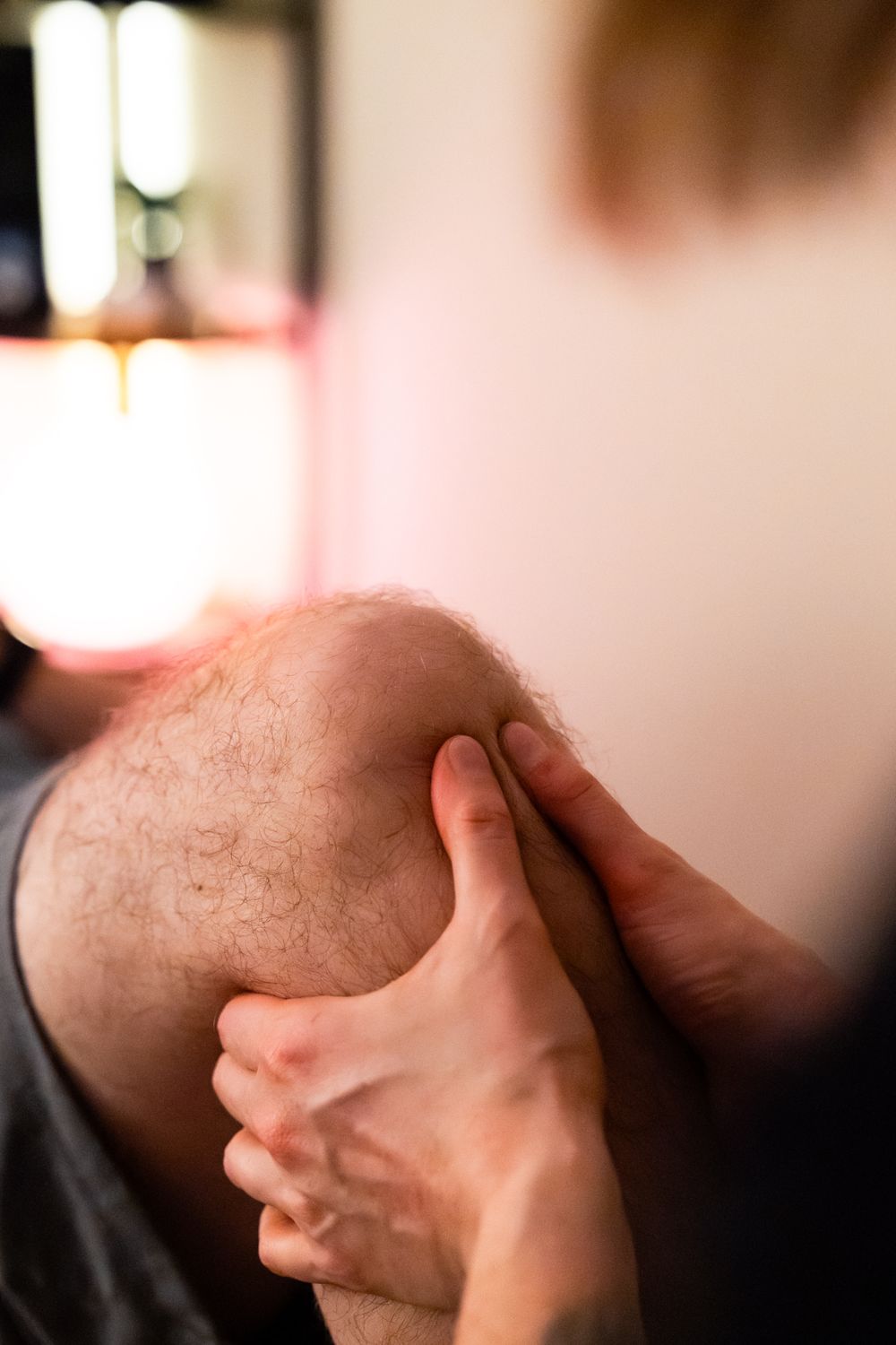 Professional massage therapy session focusing on neck muscles and pressure points.