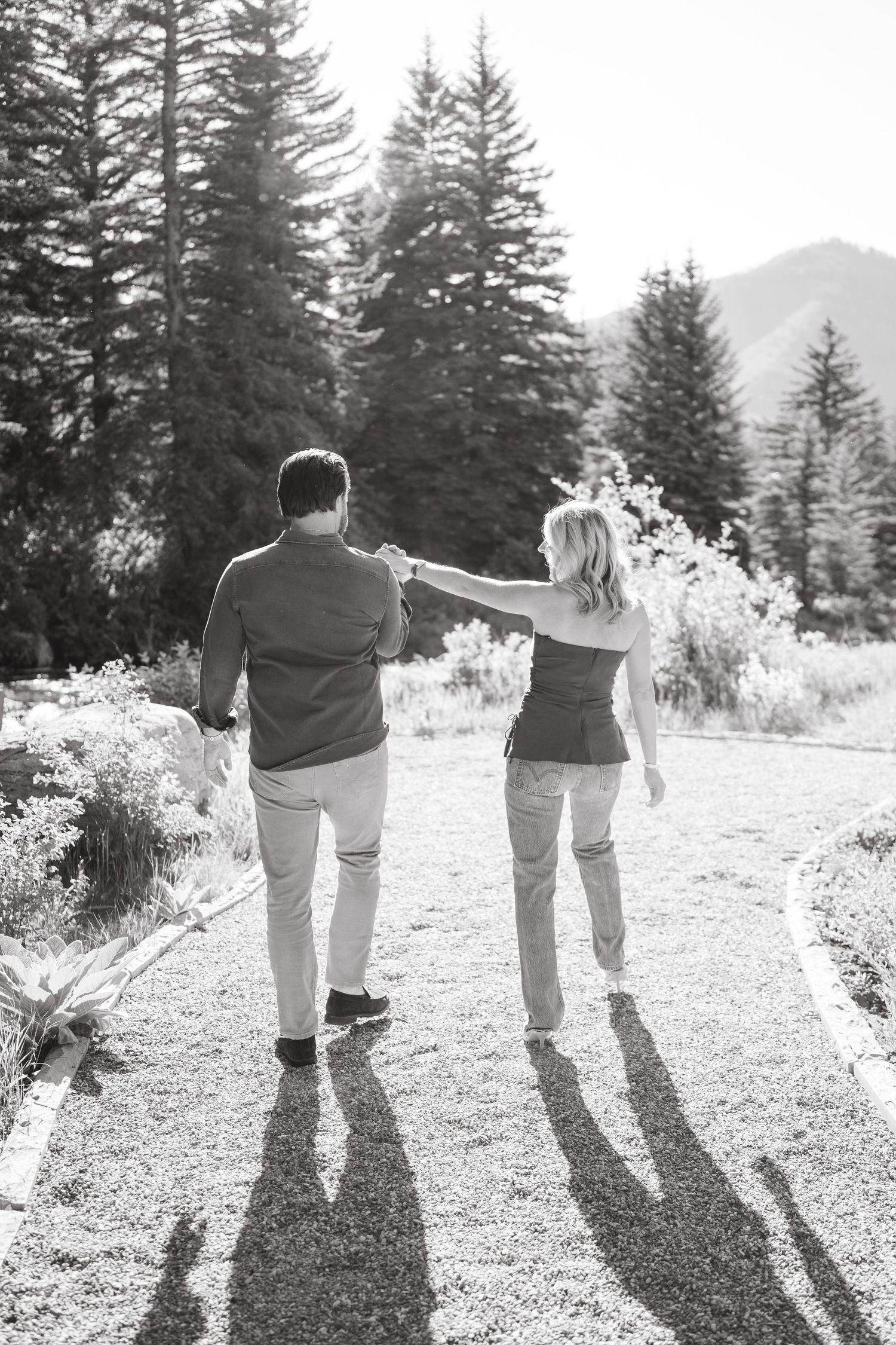 black and white - guy admiring ring he got his girlfriend