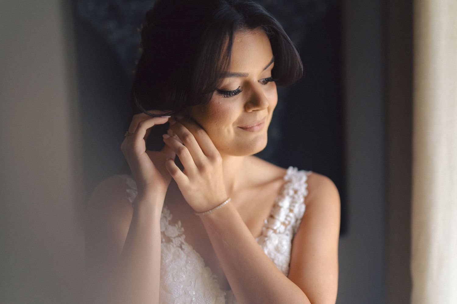 A series of romantic bridal portraits showing close-up shots of a bride in a white dress wearing elegant makeup.