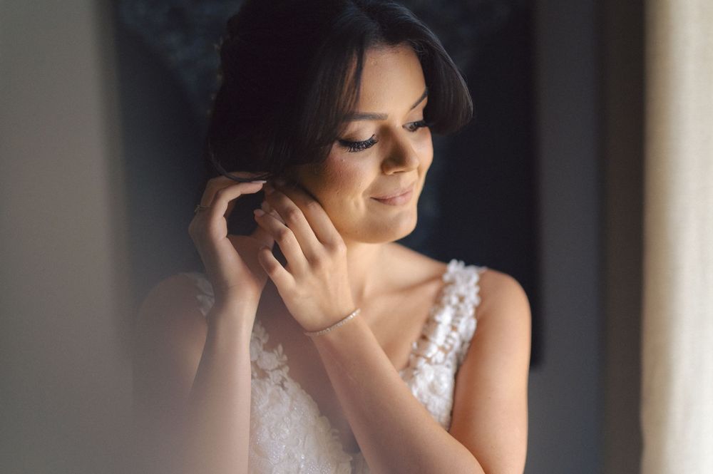 A series of romantic bridal portraits showing close-up shots of a bride in a white dress wearing elegant makeup.