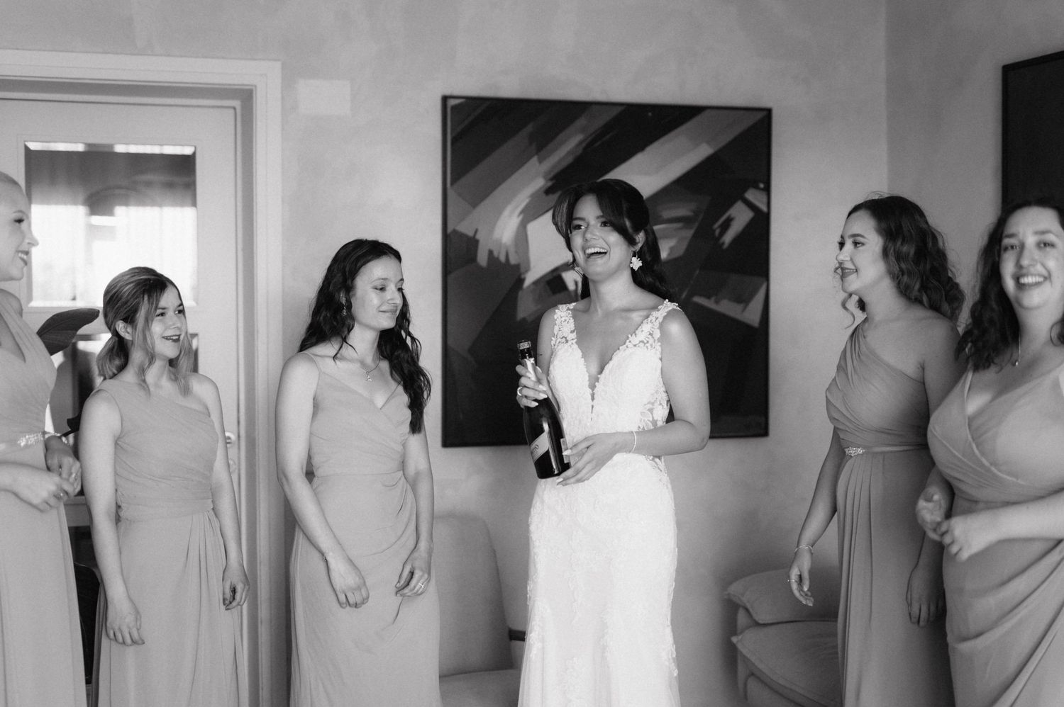 A series of black and white photos showing preparations and candid moments during a formal wedding event.
