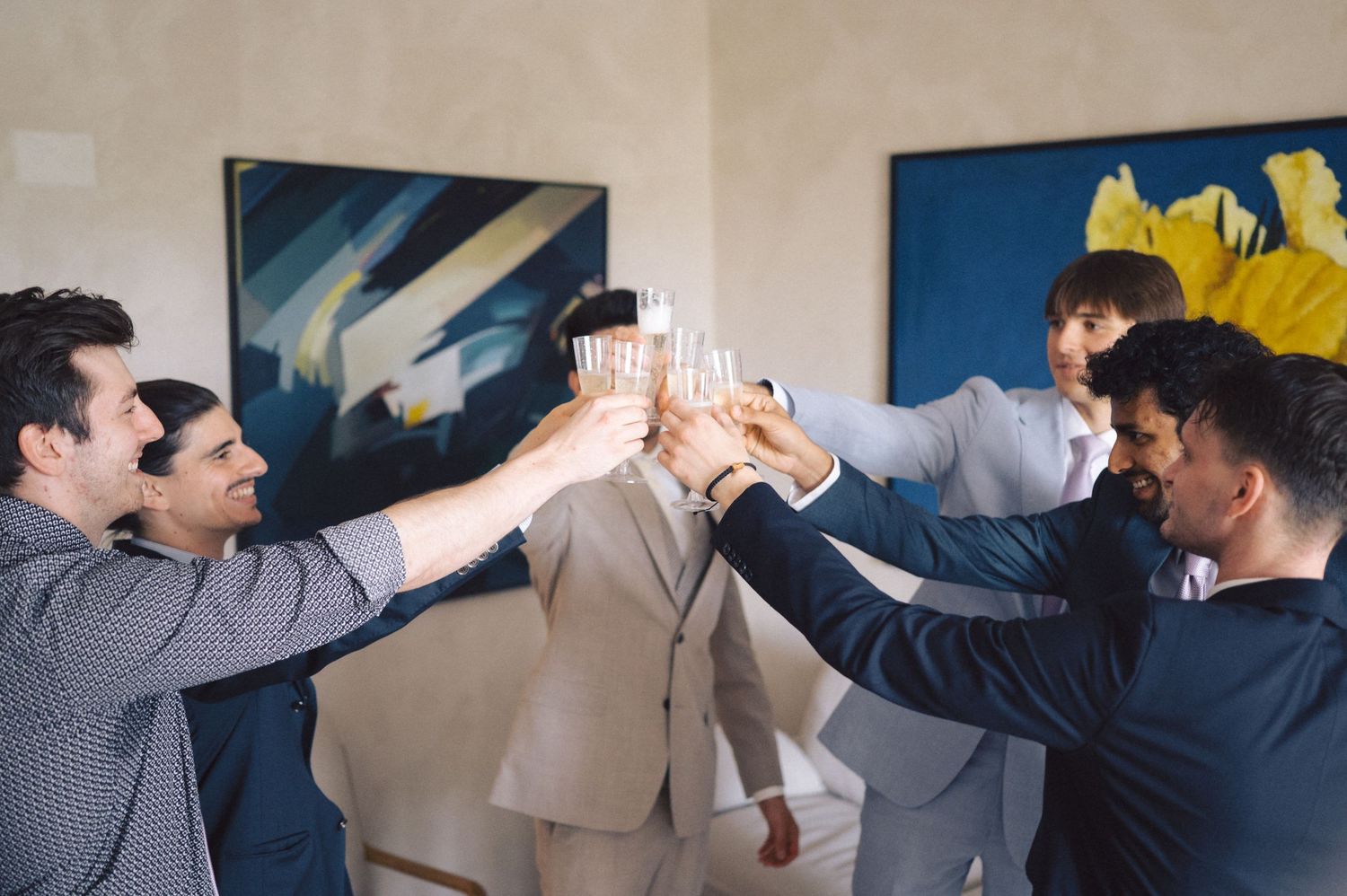 Group of dancers in formal attire performing choreographed movements in sequence across multiple frames.