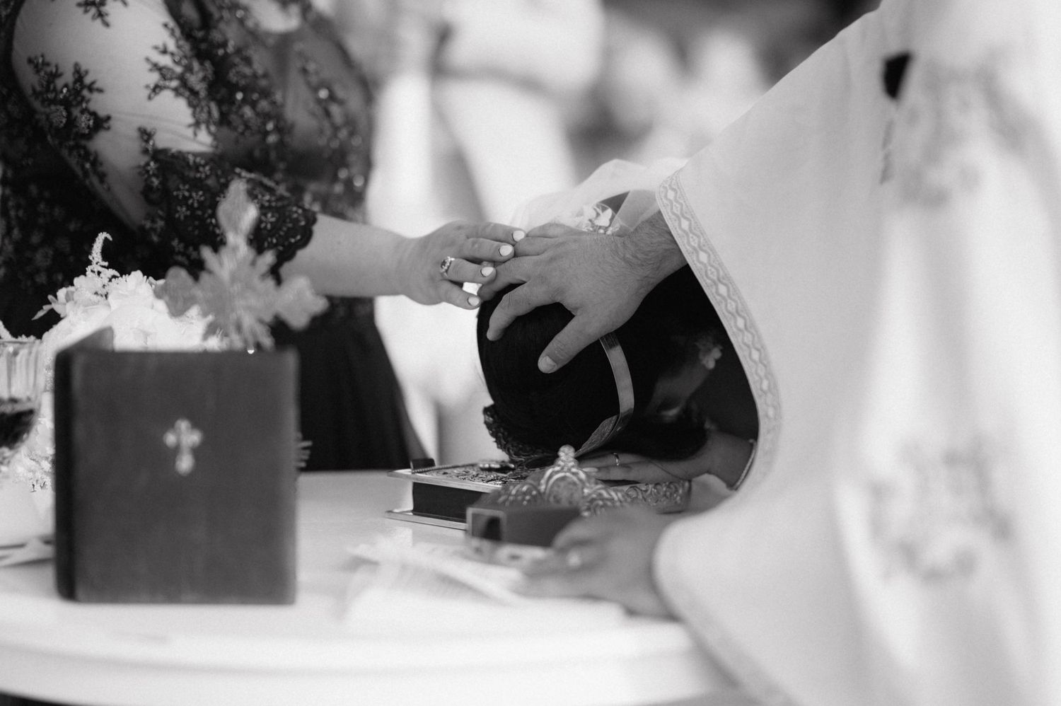 Guest raises a glass during a champagne toast at a wedding celebration.