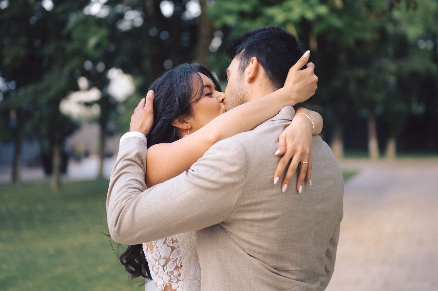 Seven romantic wedding photos showing couples embracing and kissing in various outdoor garden settings during sunset hours.