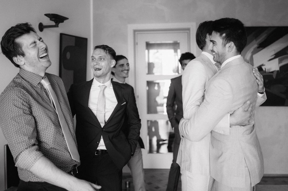 A collection of vintage black and white photographs showing people laughing and interacting in social settings.