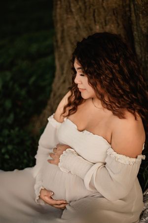 A series of photographs shows a woman in a white off-shoulder dress outdoors in soft natural lighting.