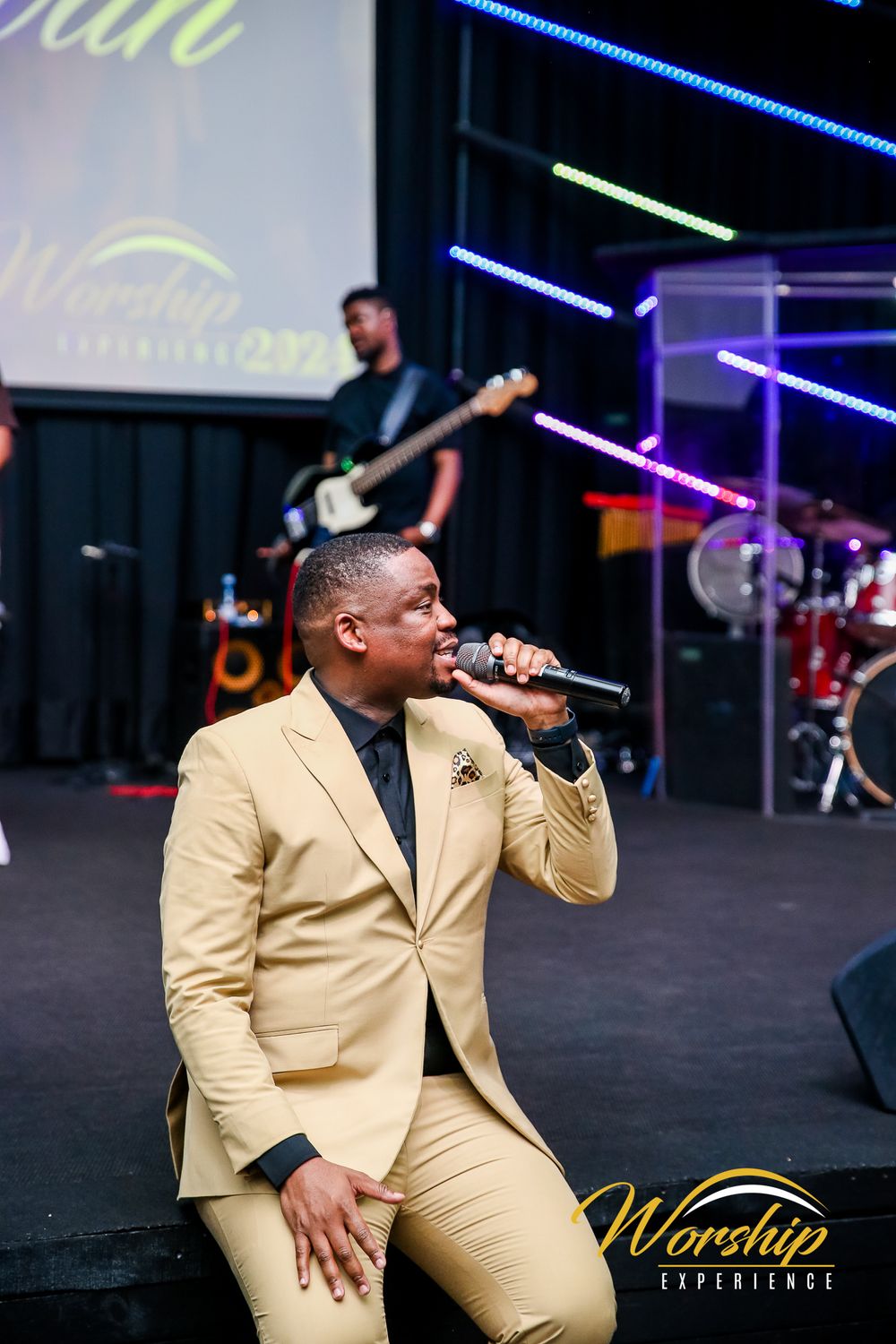 “Gospel concert crowd in worship”