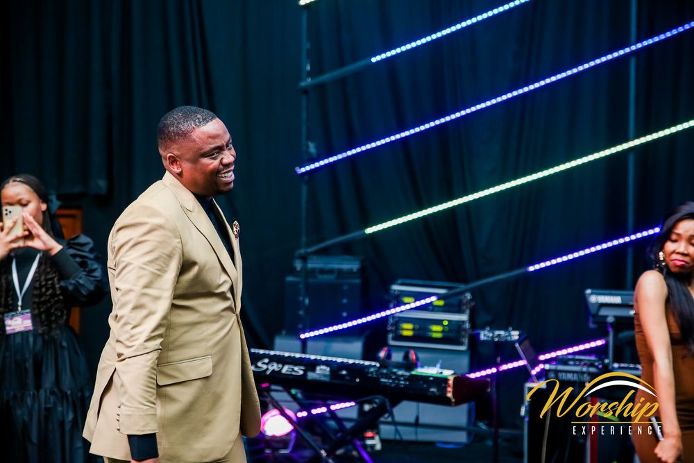“Gospel concert crowd in worship”