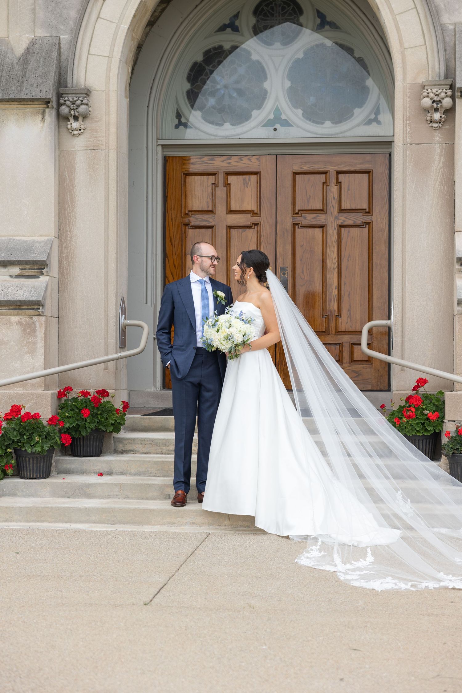A series of wedding photos showing the bride in a flowing white dress with veil entering church doors while others look on. Rachel Martinez