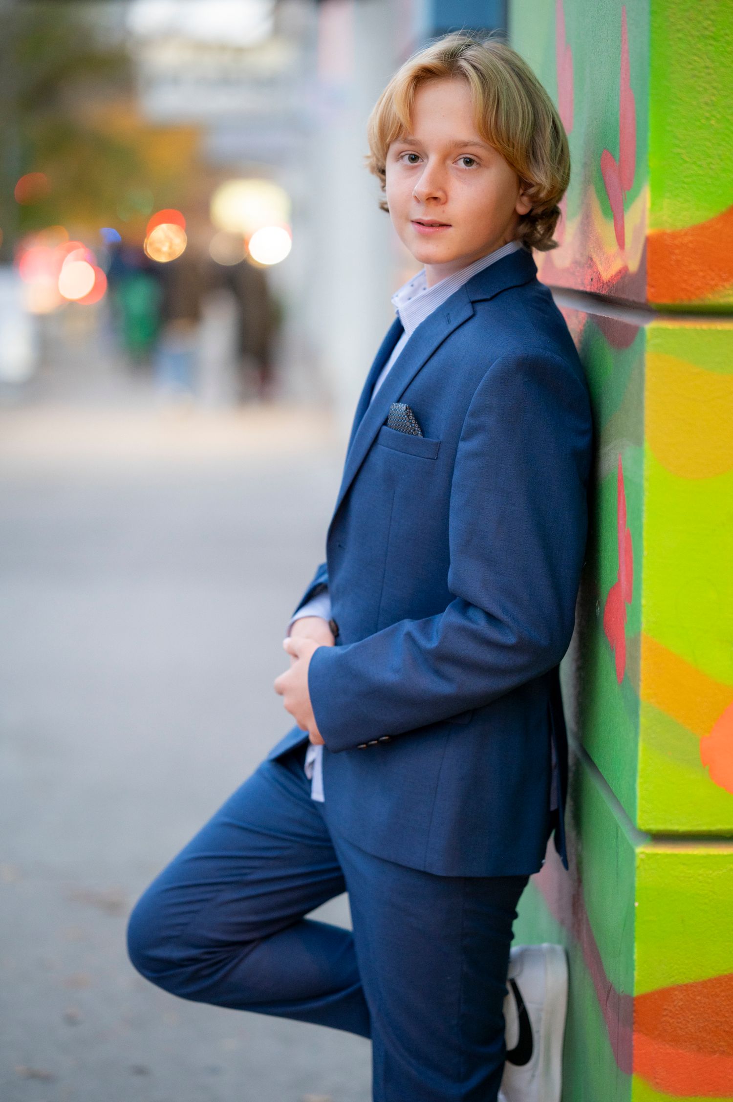 Portrait of a Bar Mitzvah boy at sunset in natural light, with downtown Toronto in the background.