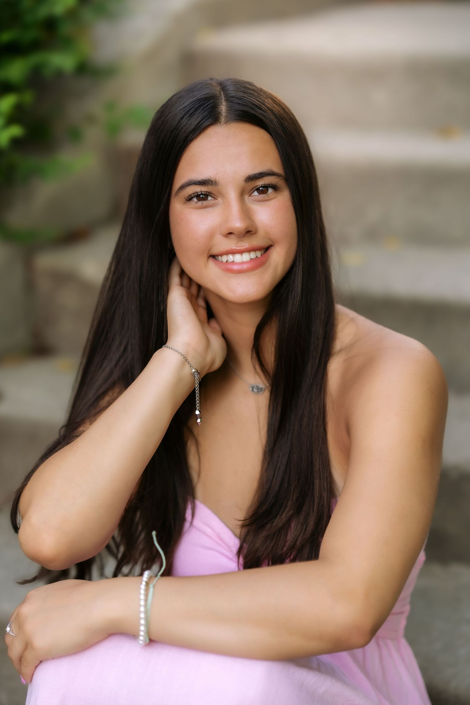 Portrait photo series showing a person in a pink dress posing against a neutral background.