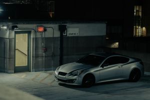 Genesis Coupe parked at night