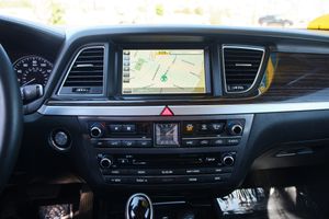 Modern car dashboard featuring navigation system display and climate control buttons.