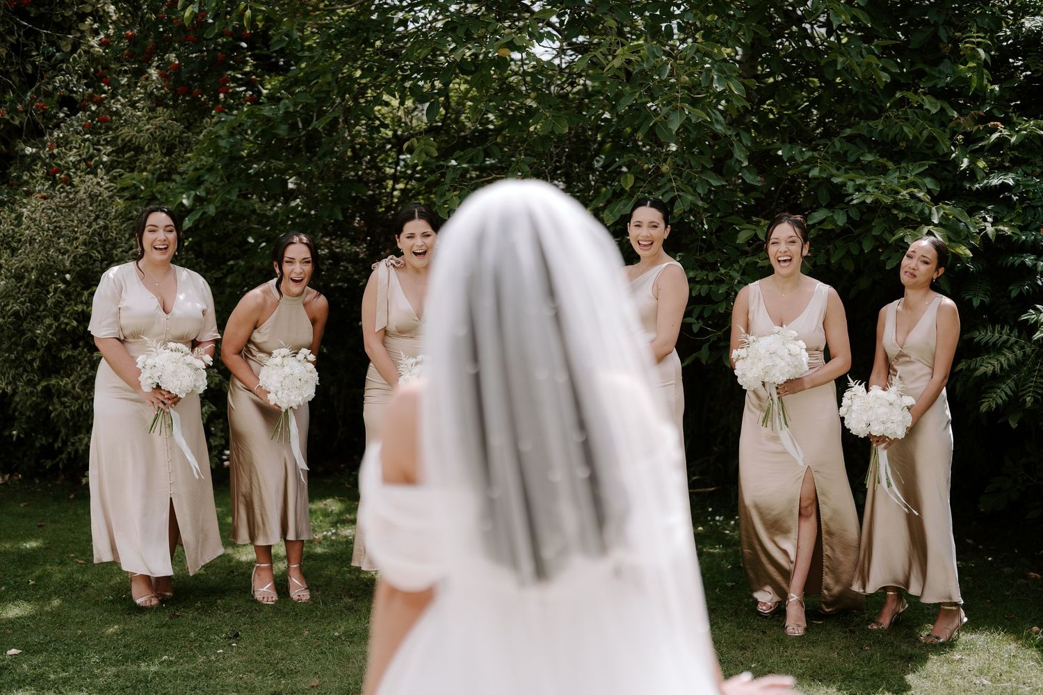 first look with bridesmaids at the new inn cirencester
