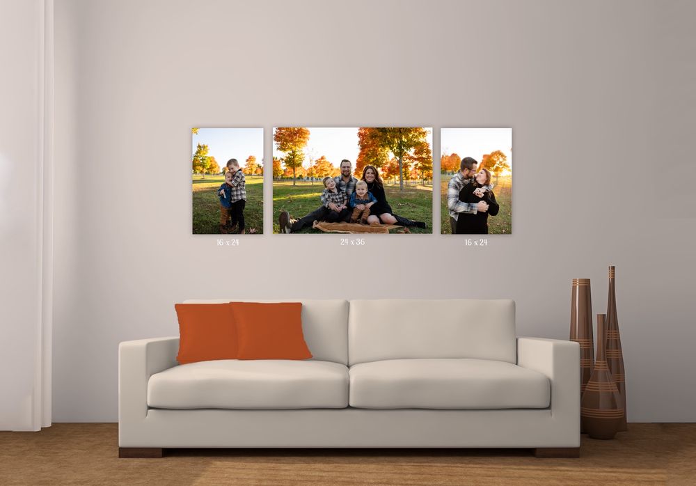 Modern white sofa with orange accent pillow shown in multiple views against a white wall with framed artwork.