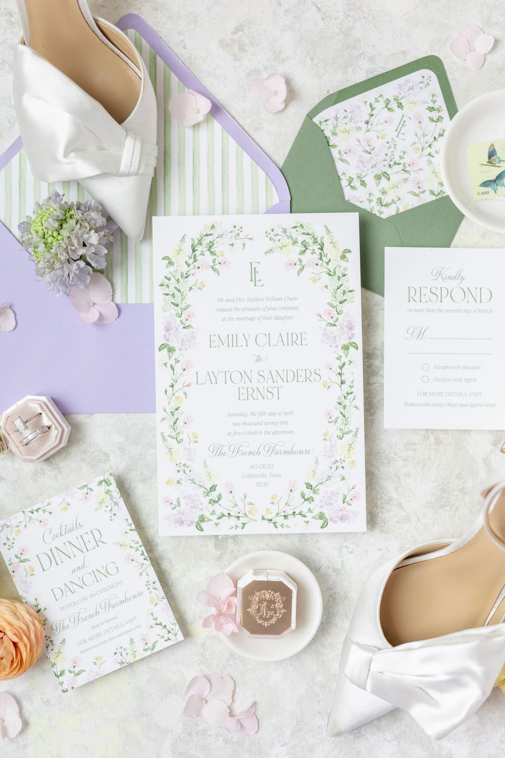 Wedding invitation suite for Emily Claire and Layton Sanders Ernst with floral wreath design.