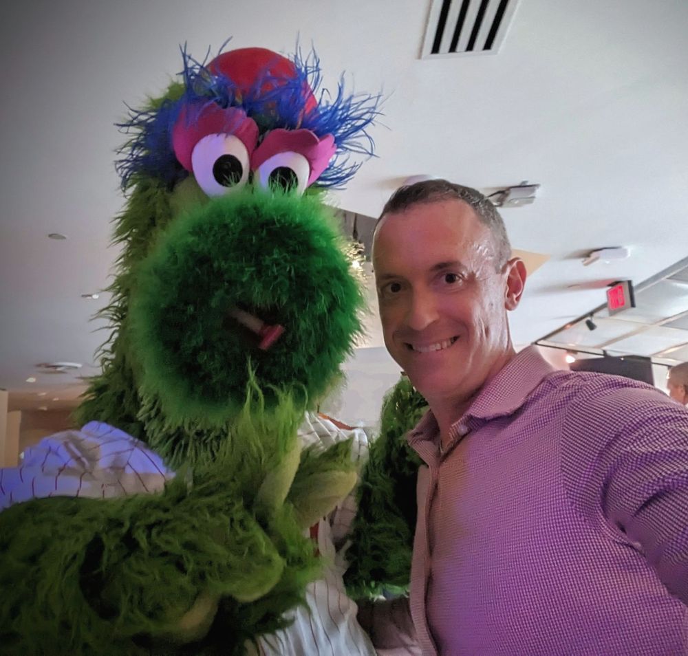 A green furry puppet character appears in multiple shots alongside someone in a purple shirt.