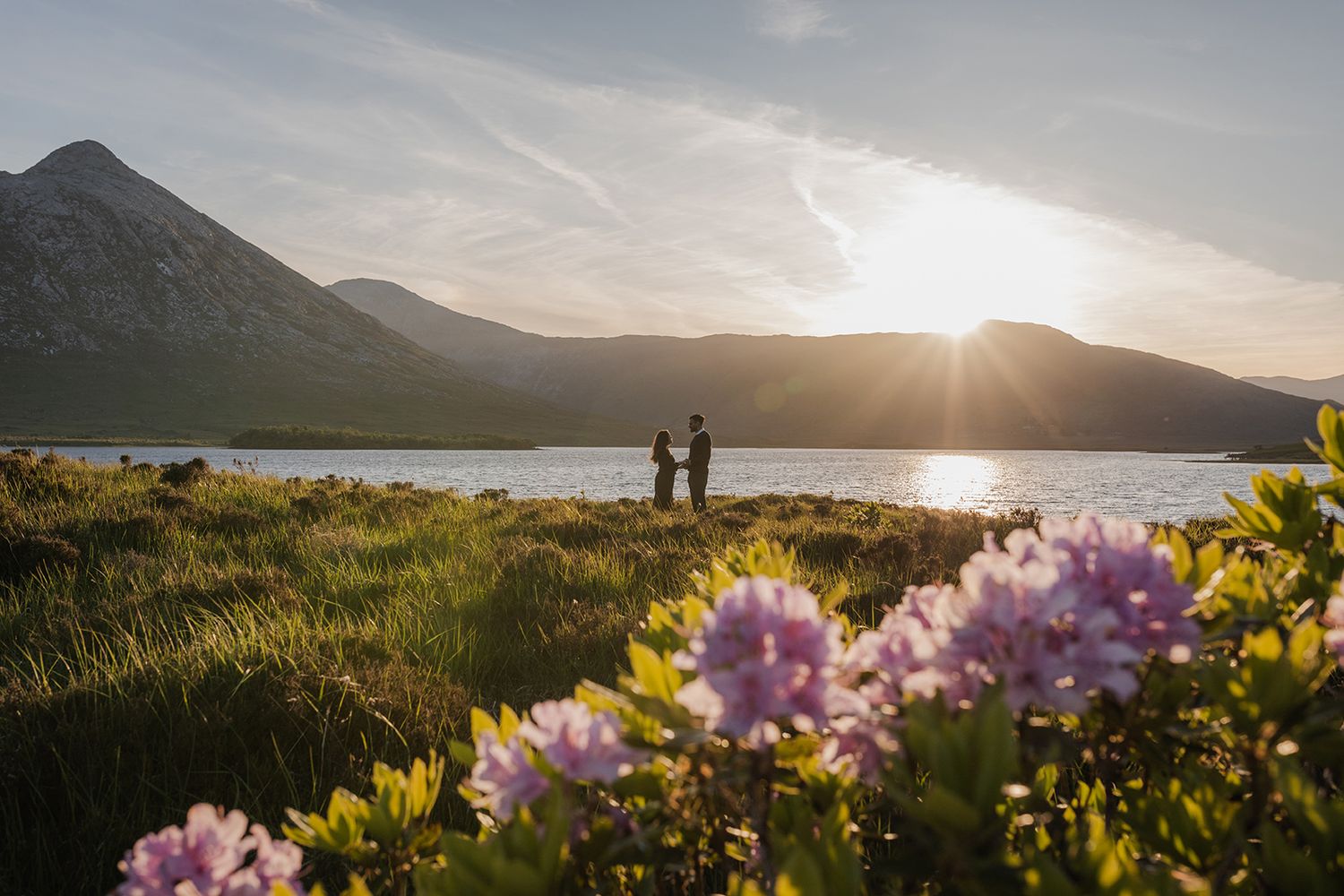 Elopement session in spring with lush green Connemara fields