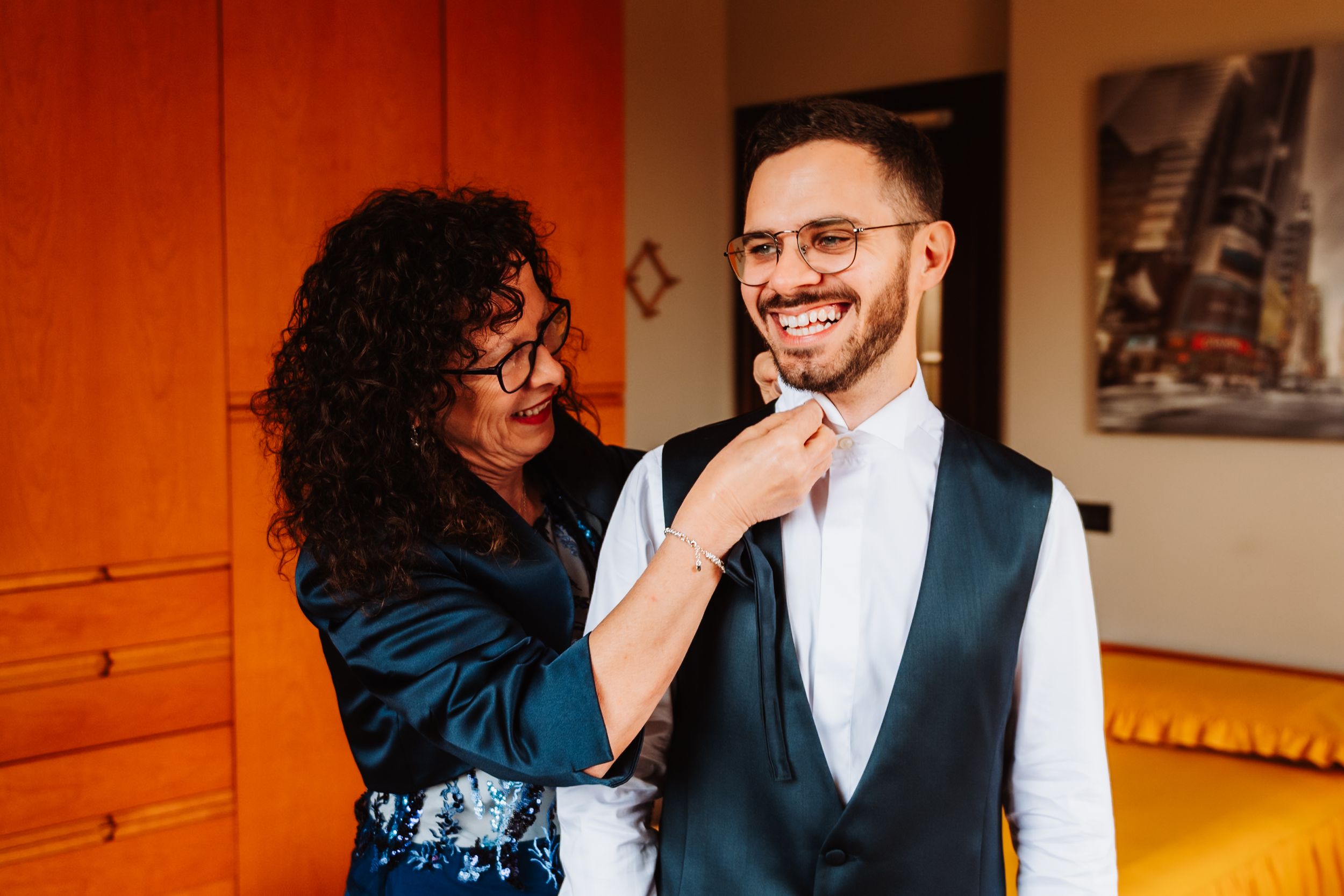 A couple shares intimate moments in a series of candid photos showing their love and laughter together.