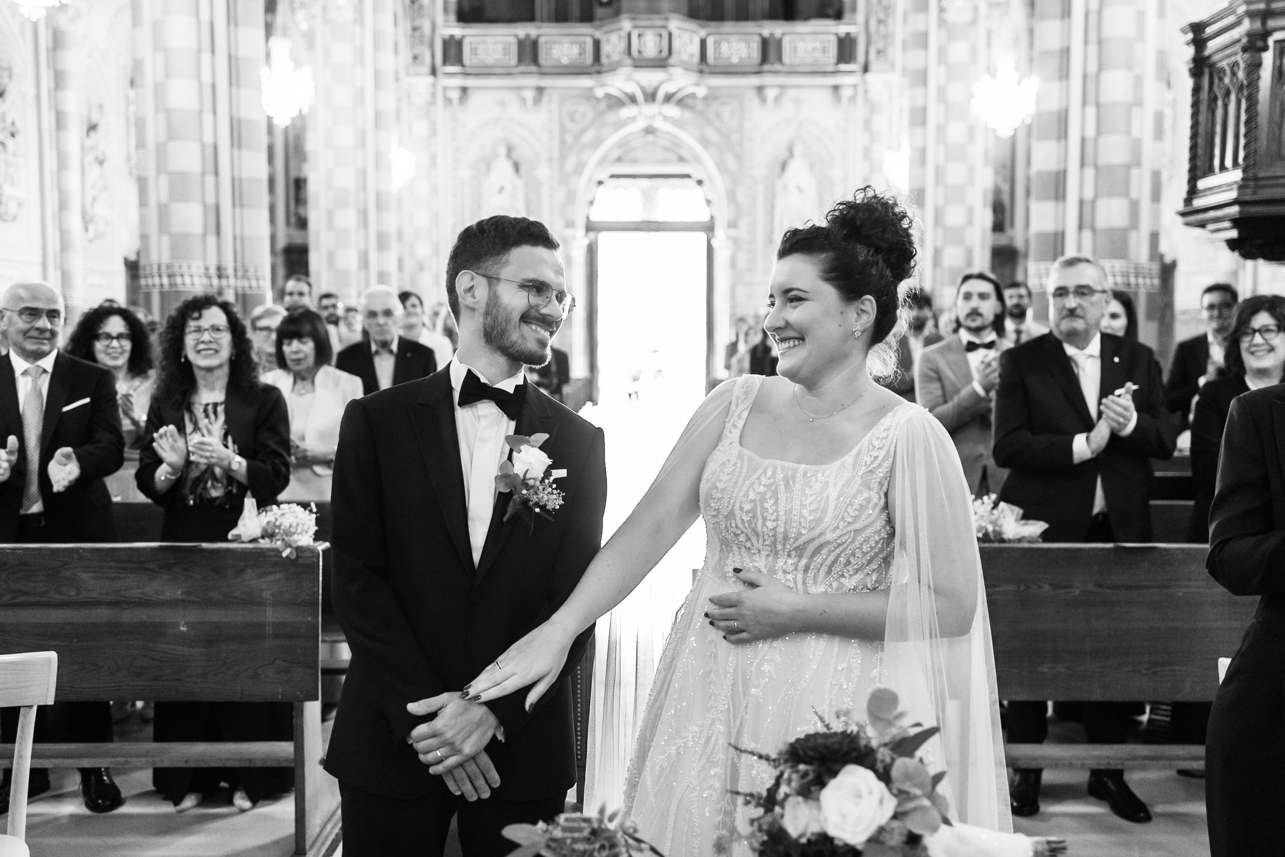 Black and white photo collage showing multiple wedding moments with couples dancing and celebrating at a reception.
