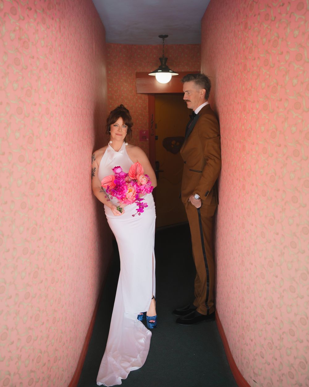 A sequence of photos showing someone in a white dress walking down a pink-wallpapered hallway.