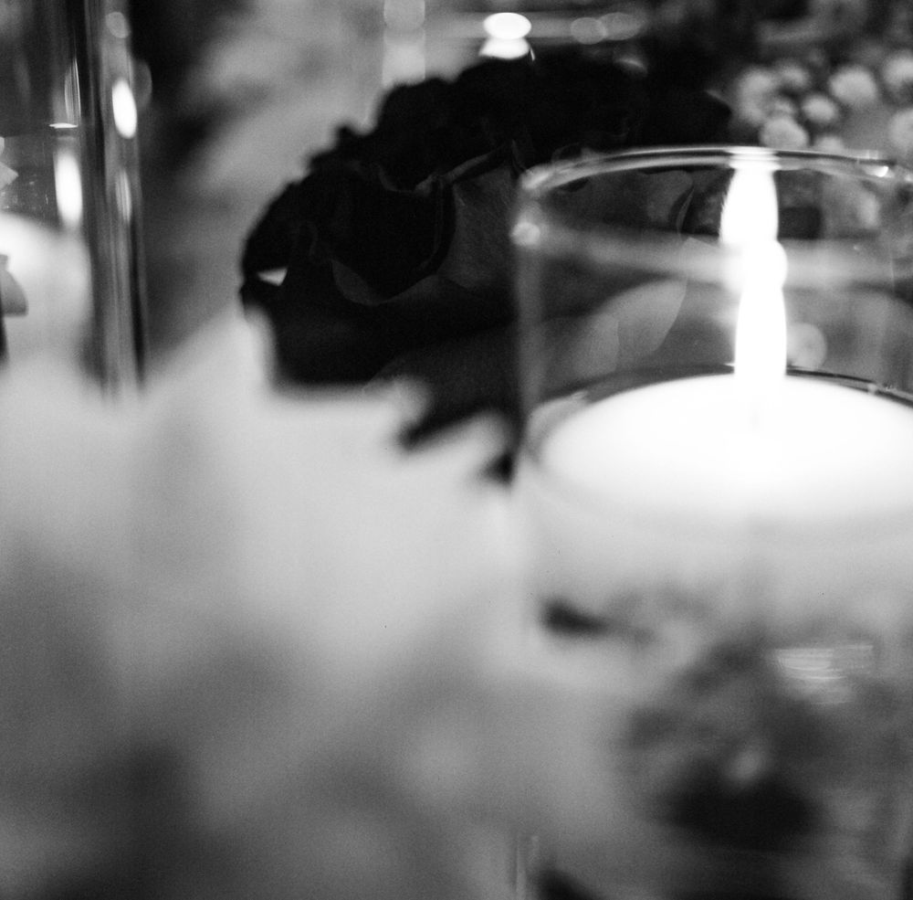 A film closeup of a floral decoration at a Cuneo Mansion wedding reception.