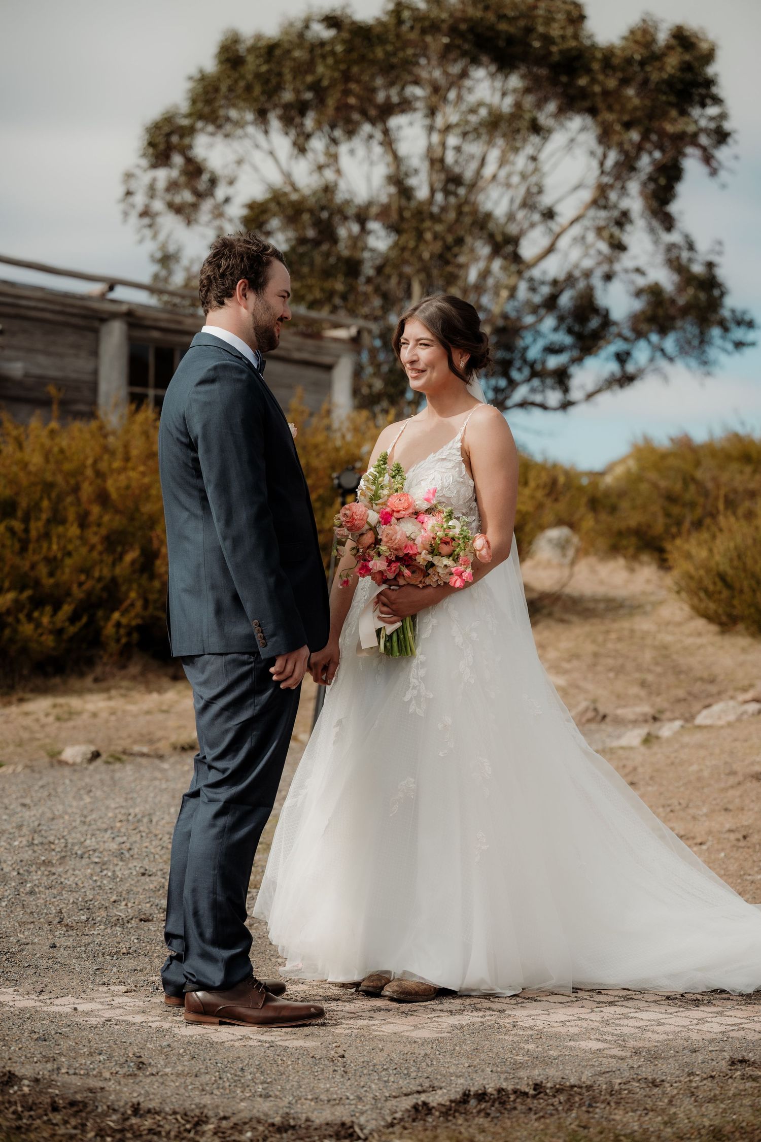 A series of wedding photos showing a couple in formal attire standing outdoors on a gravel path with natural scenery.