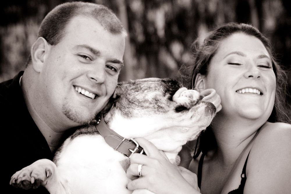 A collection of black and white romantic photos showing tender moments between a couple.