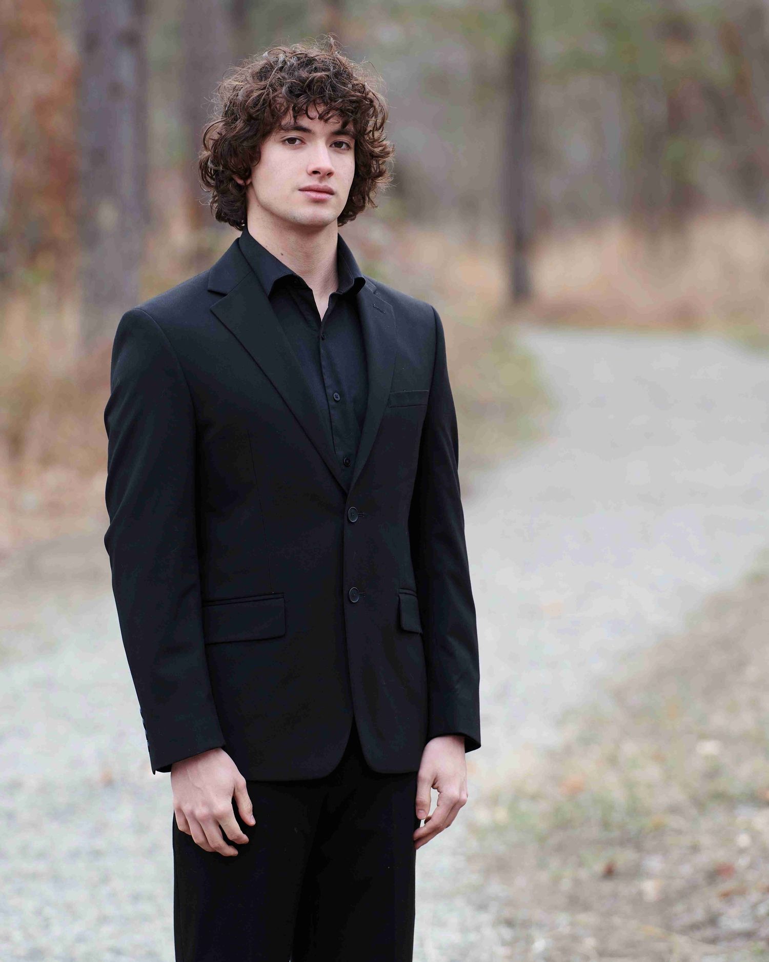 Marshall's high school senior photo at the trailhead of the Okanogan river in Okanogan, WA.