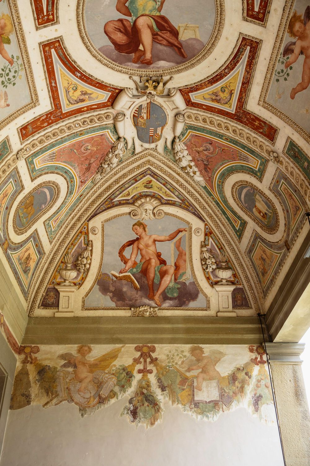 Ornate baroque ceiling fresco with elaborate architectural details and painted figures a historic palace Tenuta di Artimino, Tuscany