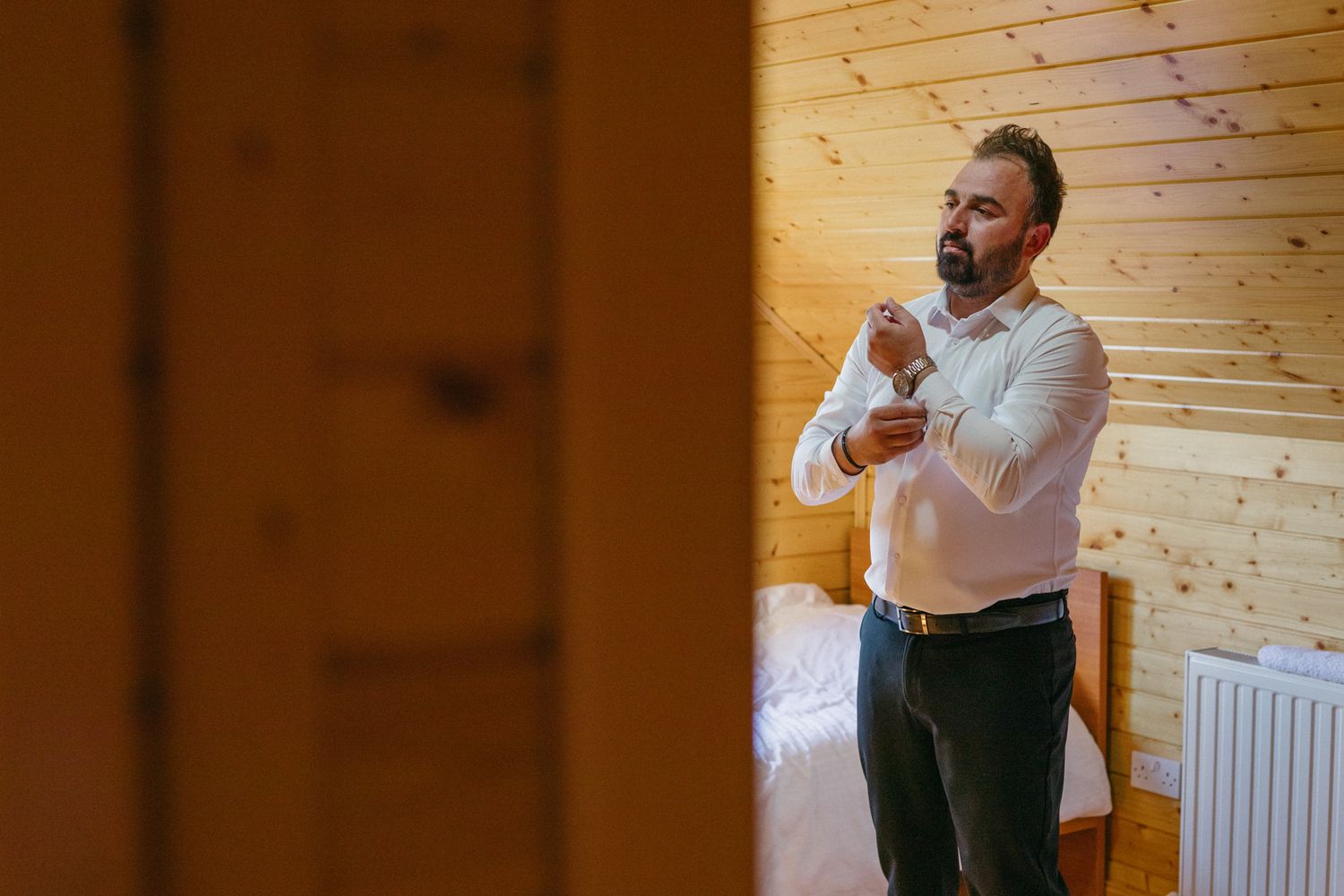 Groom is getting ready for a wedding in Cyprus, Troodos, captured by a Paphos based photographer.