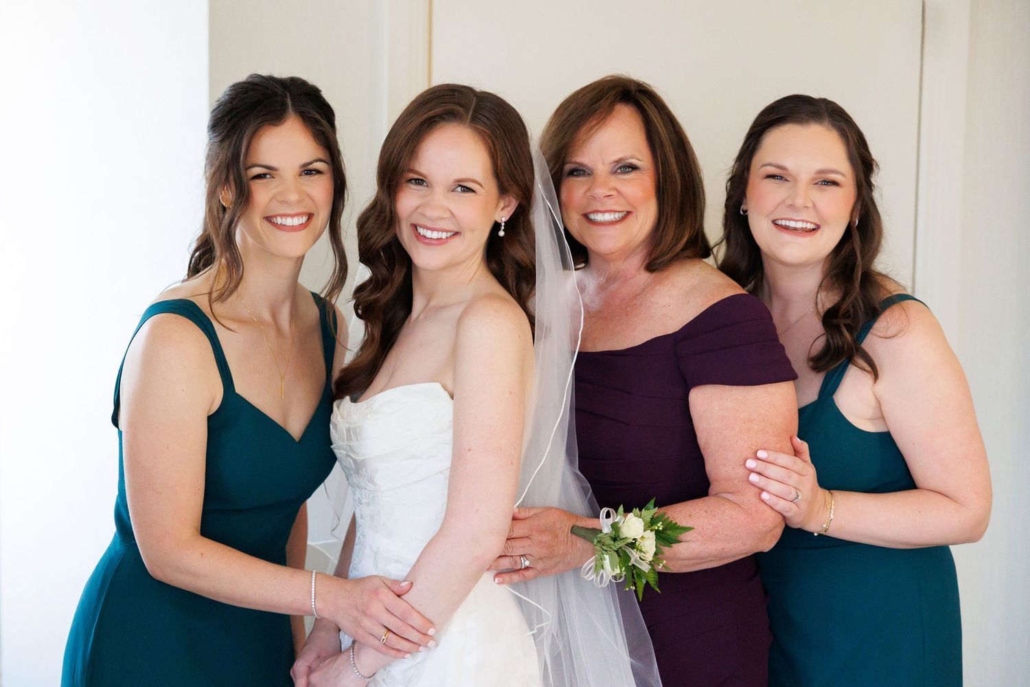 Bride with sisters and mom before wedding in Cleveland.
